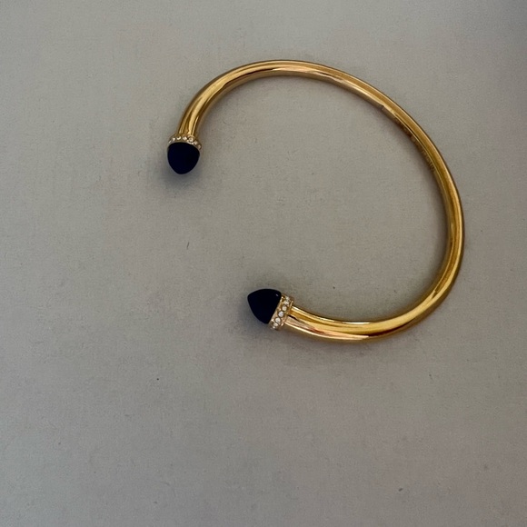 Michael Kors
Gold Tone/ Blue Arrow Open Cuff Lapis Stones Bracelet - Picture 2 of 4